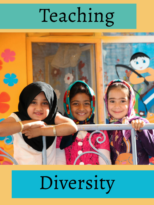 A woman wearing a peach coloured hijab and a lighter pink top, sitting on the sand at the beach in bright daylight. We see her from the back, facing the waves.