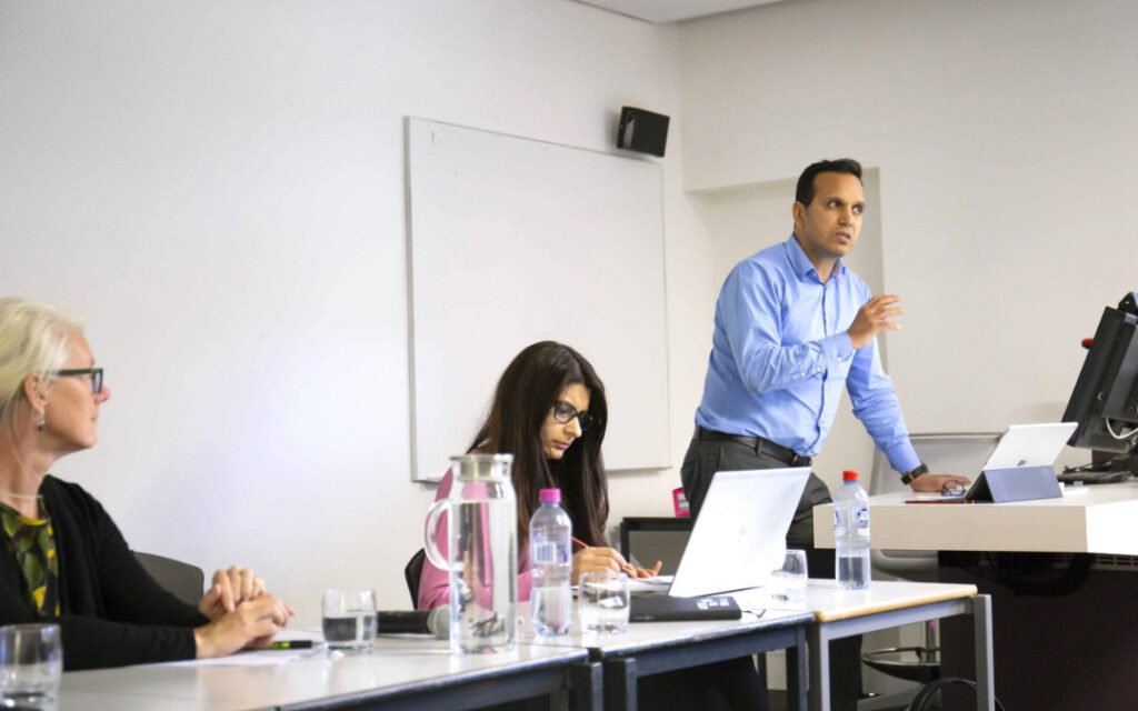 Fethi Mansouri speaking at the Migrant Youth Symposium 2019